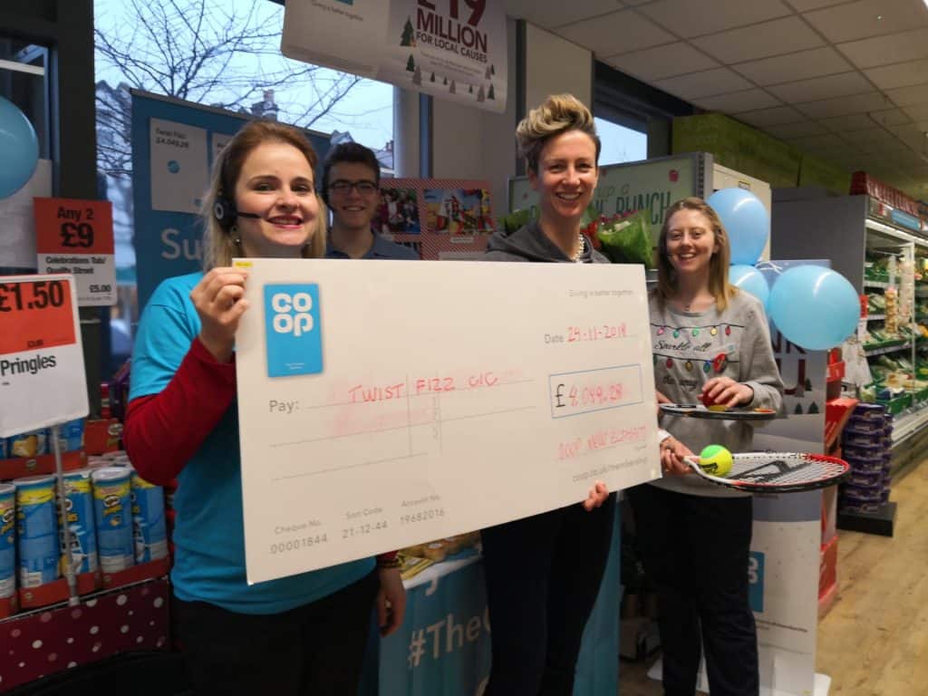 Twistfizz team awarded grant cheque by New Eltham Coop store manager